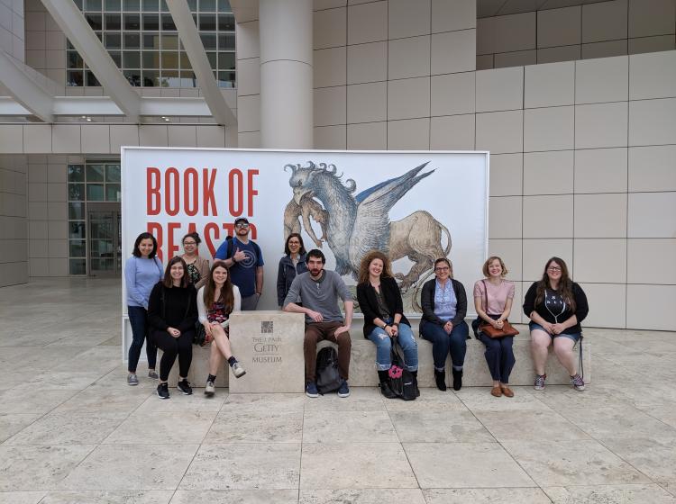 Group of students posing together on a field trip to the Getty Museum in Malibu, CA