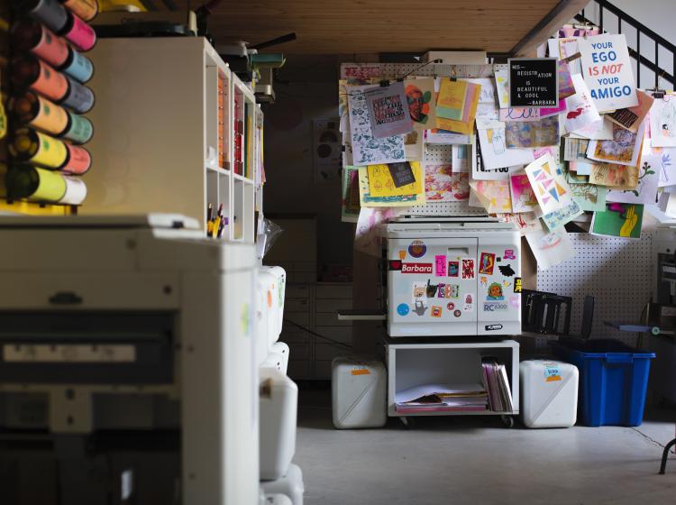 Risograph printer tucked under mezzanine