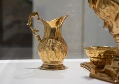 Detail of golden tea service.