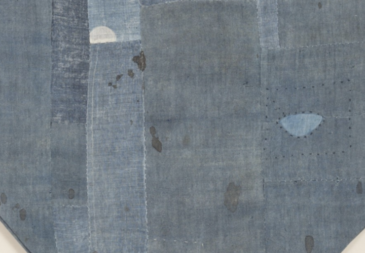 Japanese textile with patchwork pieces and embroidered patches.