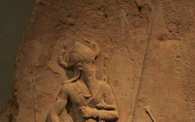 Detail of a bas relief sculpture with Naram-Sin standing on defeated warriors