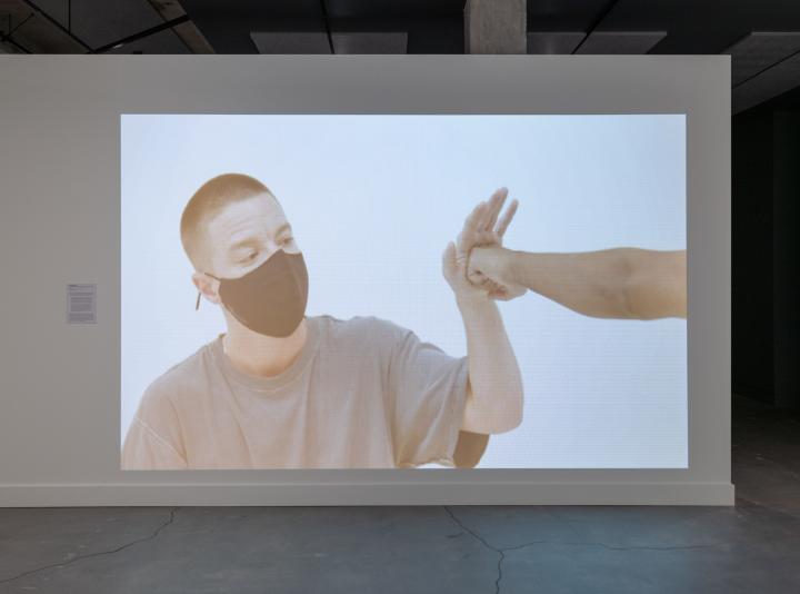 Video projection showing Nolan Hanson's Trans Boxing project.