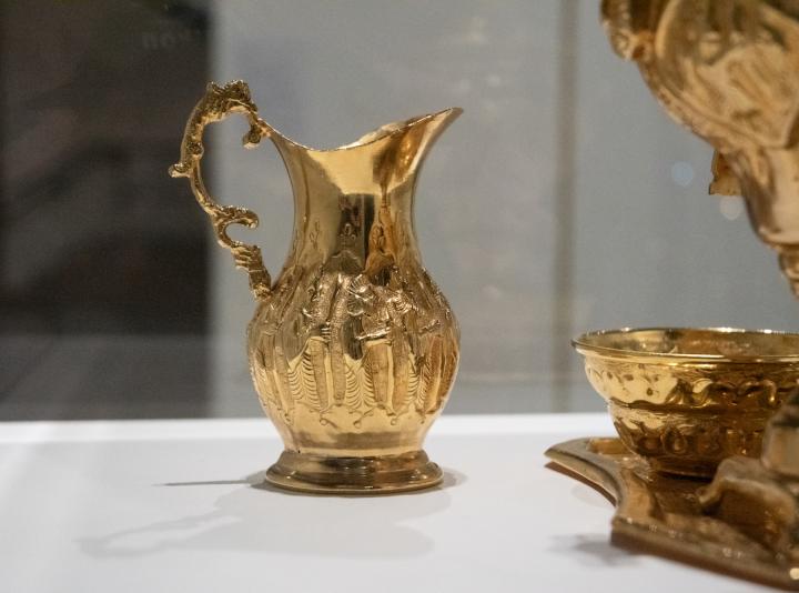 Detail of golden tea service.