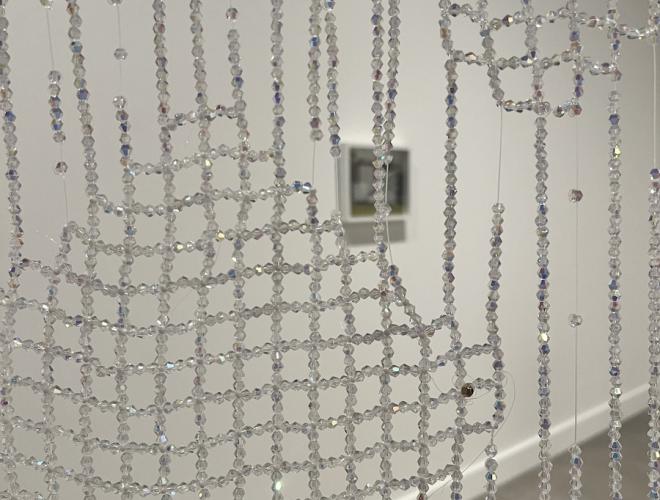 Detail view of woven crystal bead curtain.