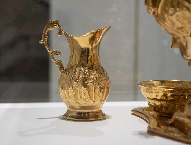 Detail of golden tea service.
