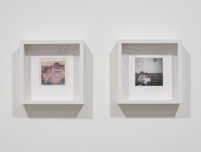 Two framed artworks made of photos with crystal bead overlays on gallery wall.
