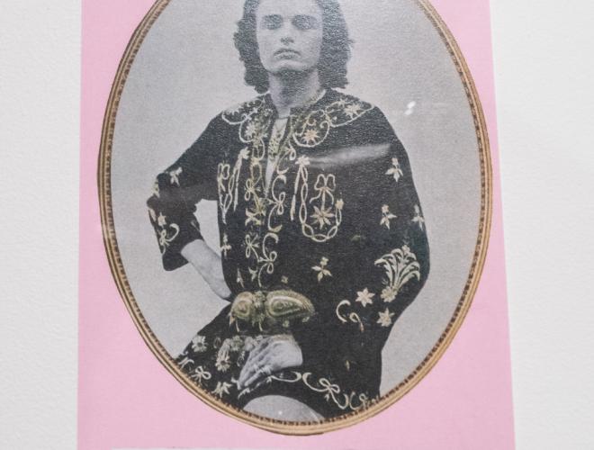 Vintage oval photo of a person in fancy dress.