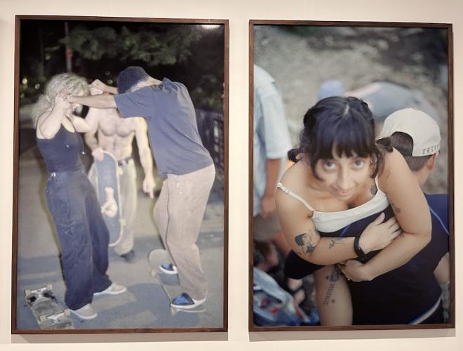Two large format photographic works on a gallery wall.