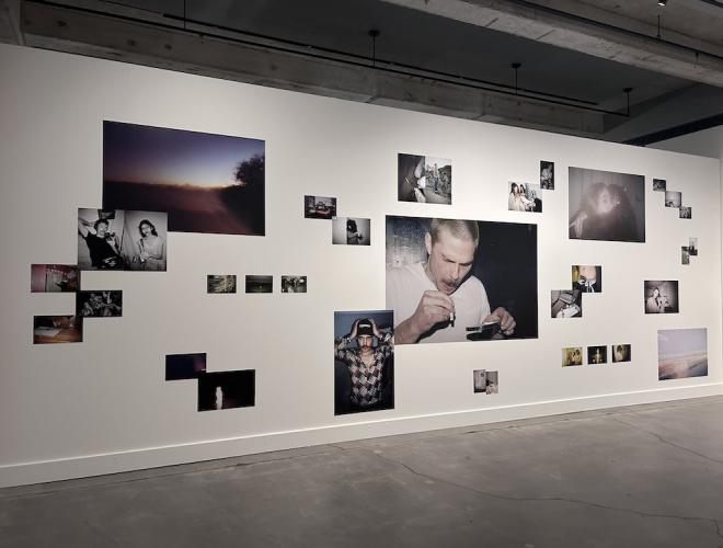 Grouping of photos by Savannah Noel scattered across a gallery wall in large and small format.