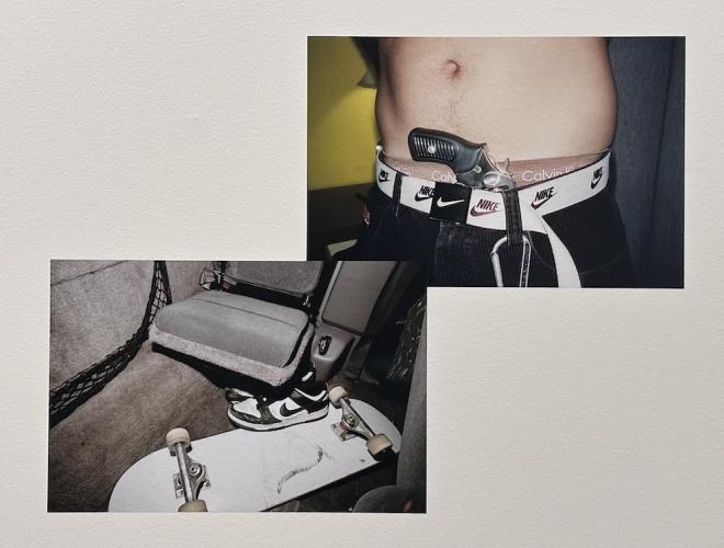 Photography by Savannah Noel featuring the torso of a man with a gun tucked into his waistband.