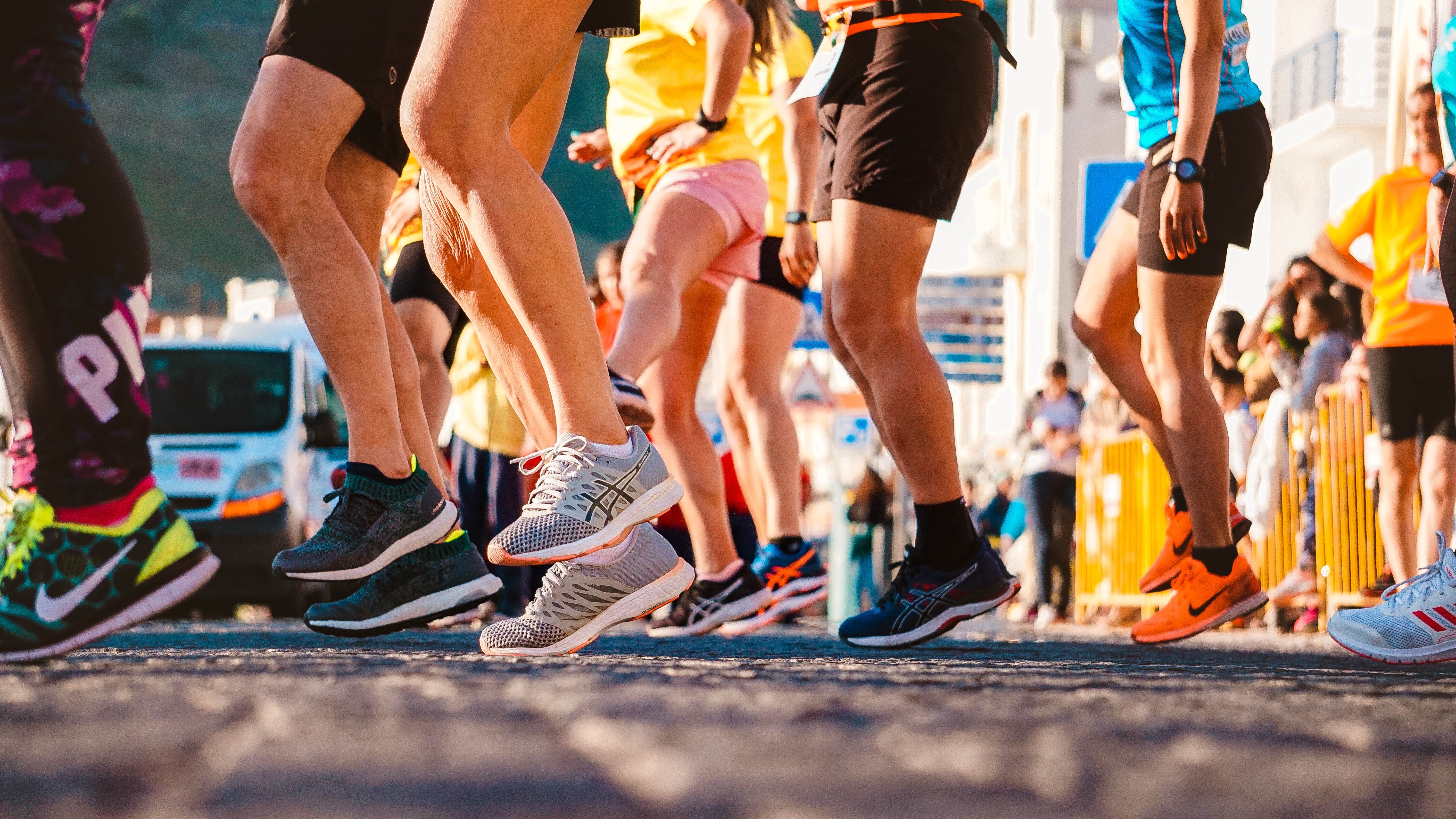 Runner legs and feet as they prepare for run