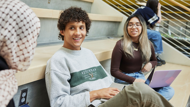 Students studying in the KMC atrium 