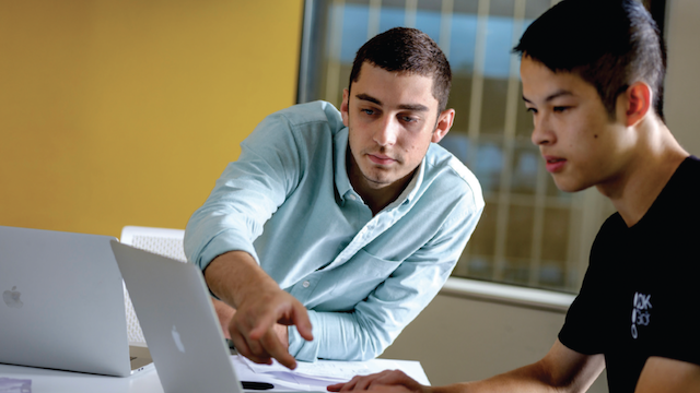 Student working on computer.