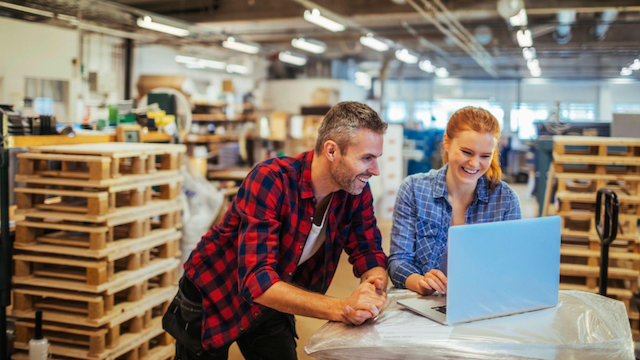 Students working on project in a warehouse