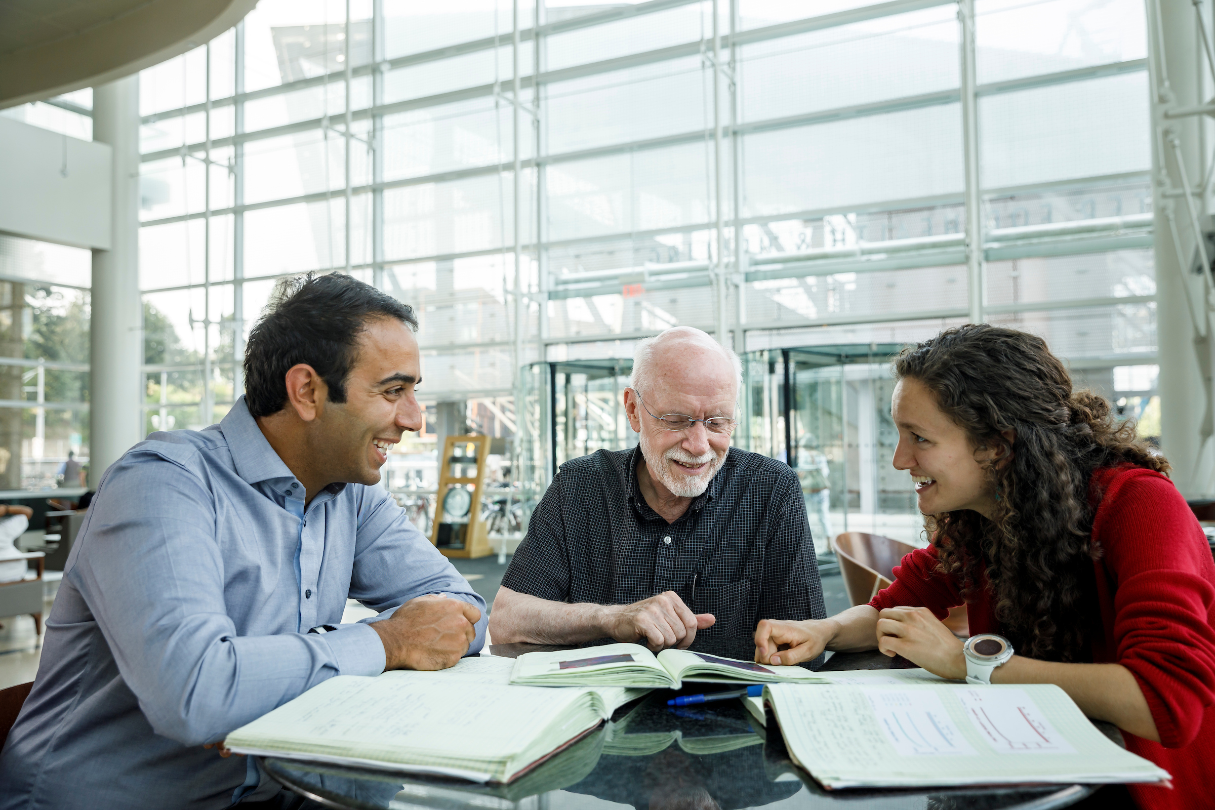 three professors having a meeting in the engineering building