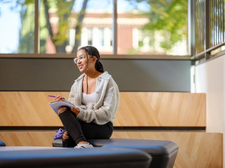 Student studying on campus