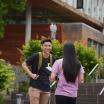 students talking on campus