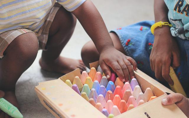 kids playing with chalk