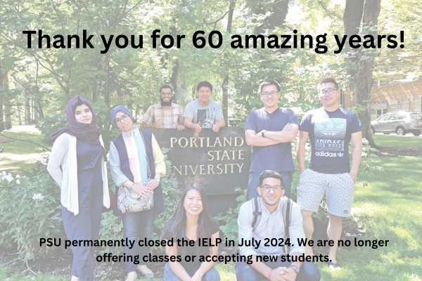 IELP students standing by the Portland State University campus sign