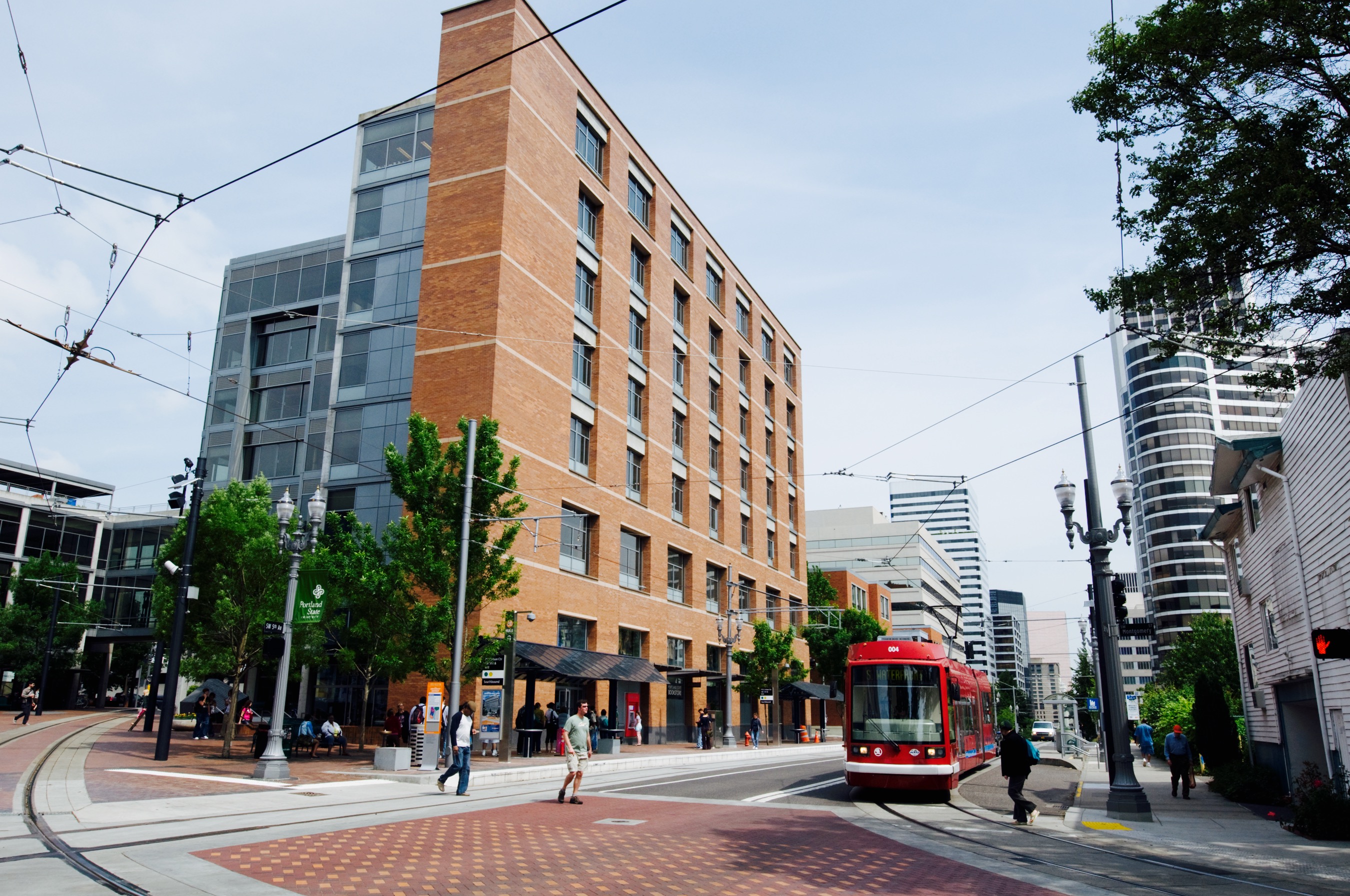 portland state university urban building with street car