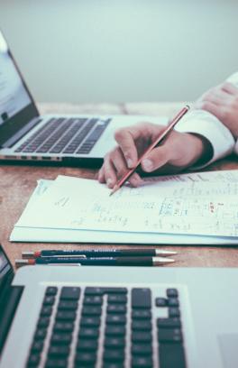 two people working on a document