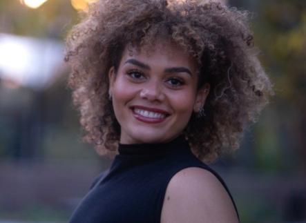 Photo of Nya MBock, Emcee for An Evening with CWL