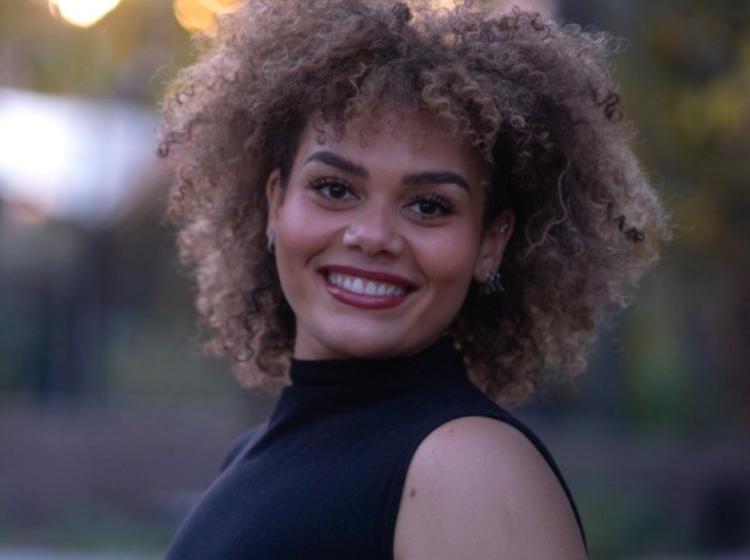 Photo of Nya MBock, Emcee for An Evening with CWL