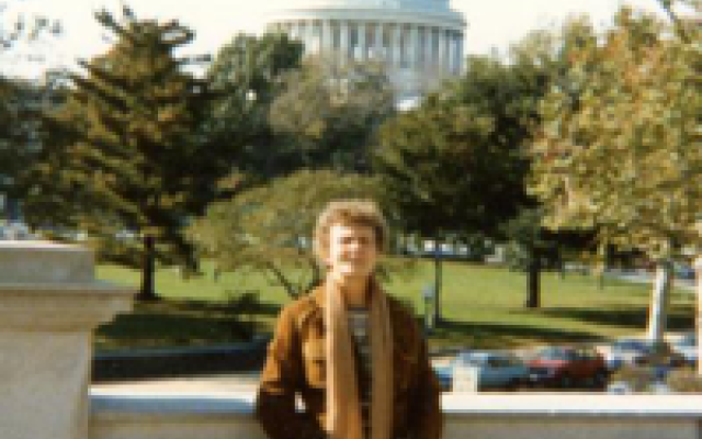 Photo of Virpi Wikman in front of Oregon Capitol building 