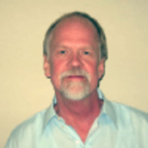 Albert Benight, a white man with short grey hair and a white beard.