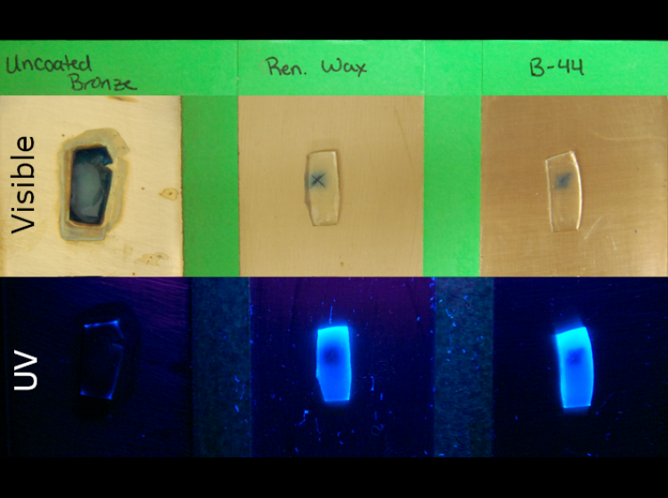 Metal plates with gels in two rows, the top row in visible light and the bottom in ultraviolet light