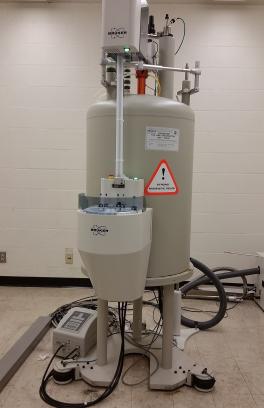 A 400 mHz NMR instrument in a white room