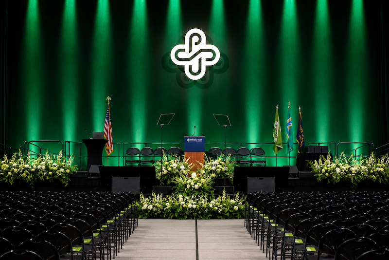 Commencement stage prepared for a PSU ceremony at Viking Pavilion