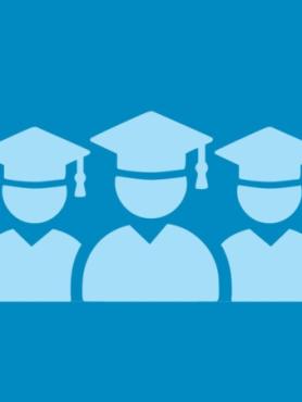 Three graduates in blue caps and gowns