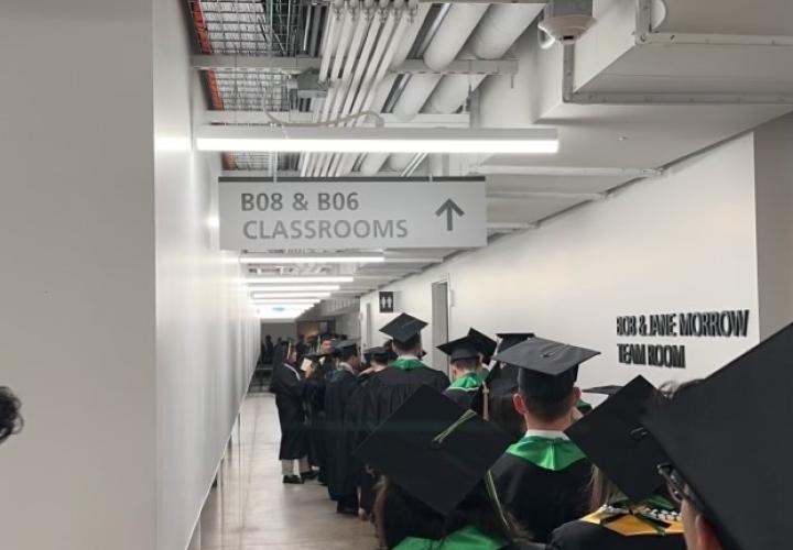 Graduates line up in processional