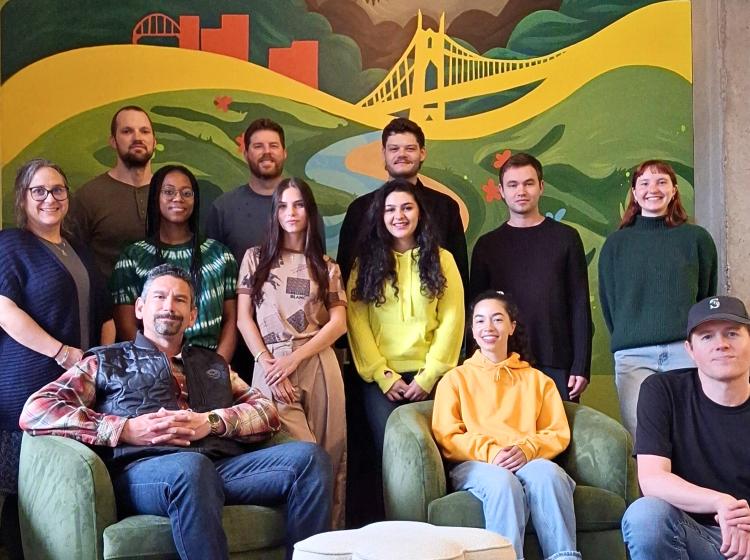 2025 Graduate Students in fron of Portland mural