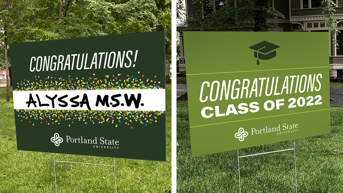 Two sample signs -- Dark Green with bubbles and Class of 2022 in PSU green -- on display in the Park Blocks.