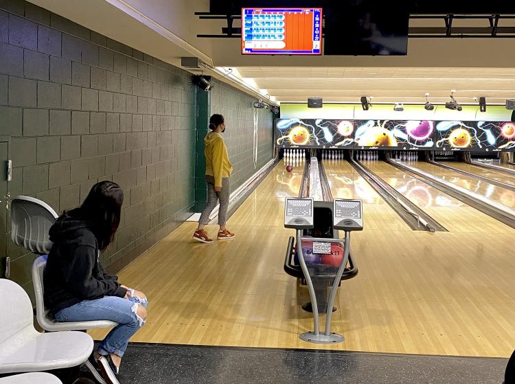 Students spend time bowling in the Viking Gameroom. Pool tables and video games are also available.