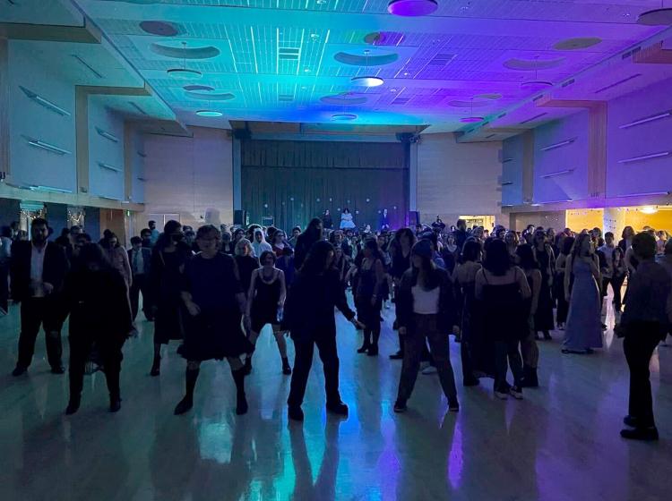 Students and participants dance in the Smith ballroom