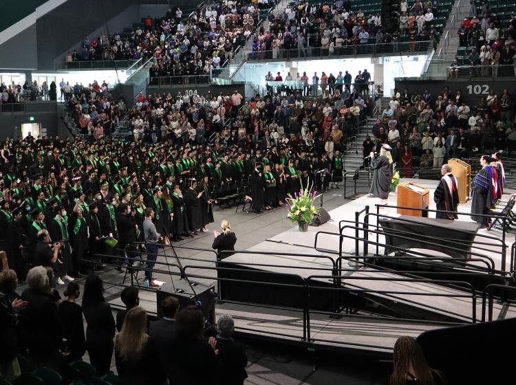 Thousands gather in the Viking Pavilion Arena for the College of the Arts commencement ceremony