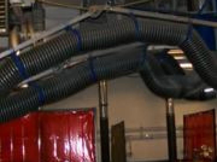 Photograph of a portion of the pipes that are underground and make up a portion of the steam and chilled water loop