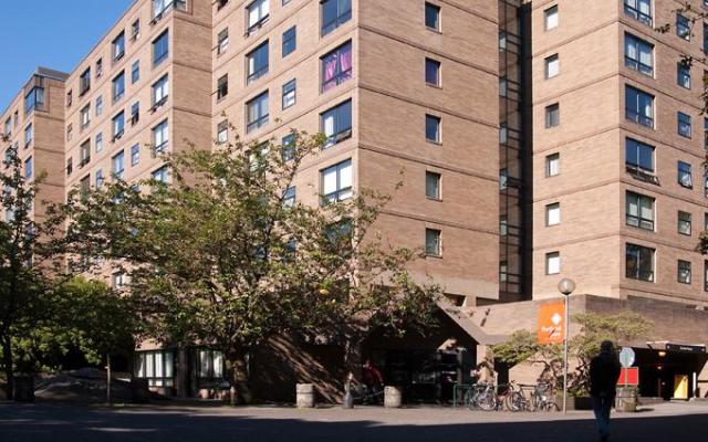 The exterior of Blumel Hall, including a view of almost all the floors and the entrance