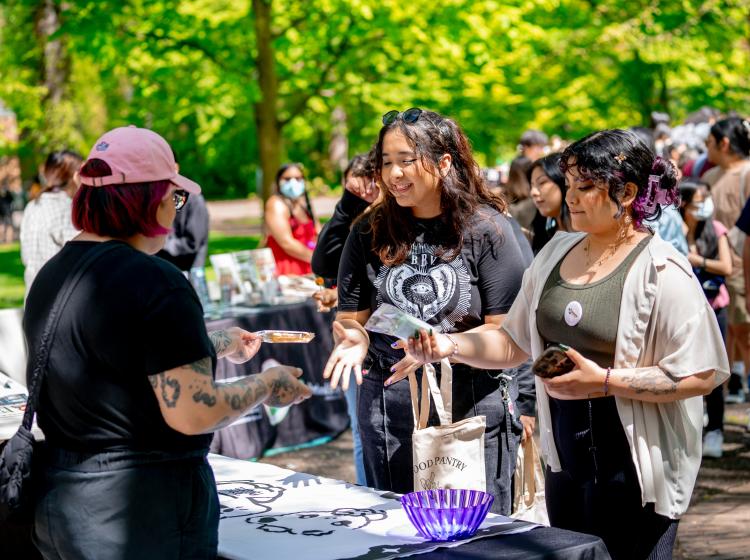 Ice Queen handing out popsicles at Mariachi in the Park 2023