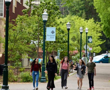 students walking on campus