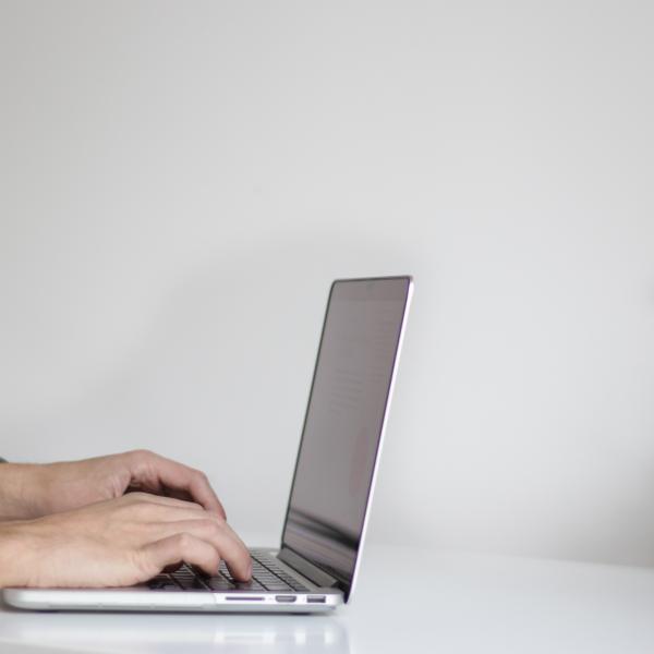 Hands on a laptop computer