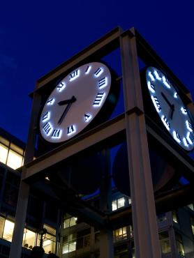 Clock Tower in Urban Plaza at night