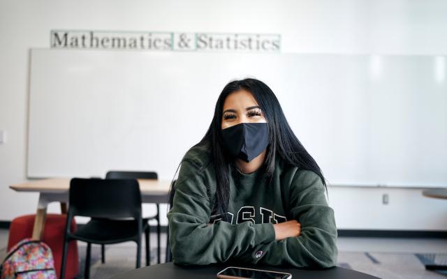 Student wearing mask in classroom