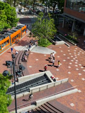rooftop photo of PSU urban center and Portland street car