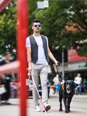 man with guide dog