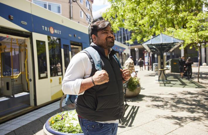 Student exiting MAX train