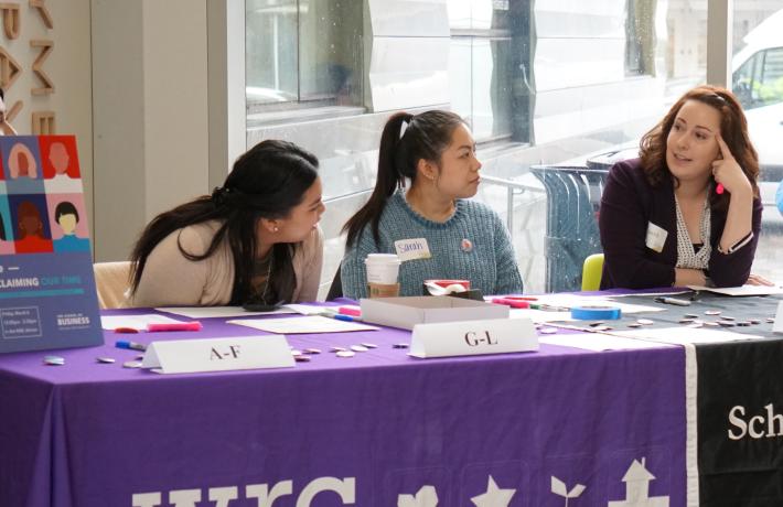 Students tabling for Women's Resource Center